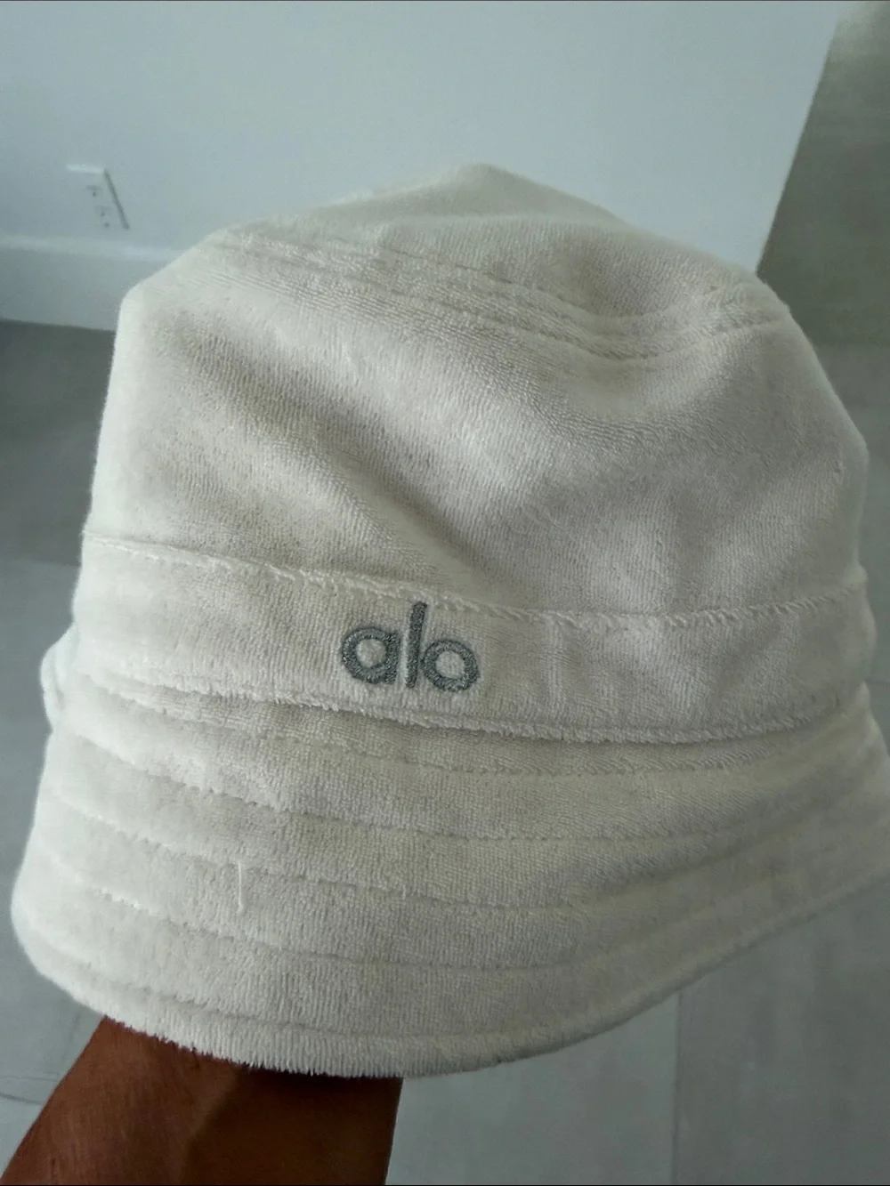 ALO Yoga Cream Plush Bucket Hat with Gray Embroidered Logo